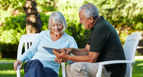 Aspire Blog - Five Tips for Choosing Medicare - Couple sitting outside