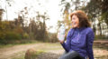 Women stays active in the winter by exercising and hydrating