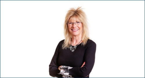 Aspire Blog - Headshot of Susan Sanders, health plan advisor, against a white background